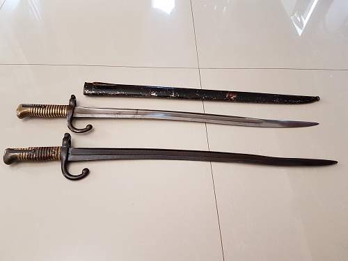 Having trouble identifying bayonet's origin...German Rolling Block Bayonet mod. to fit 1871 Mauser???