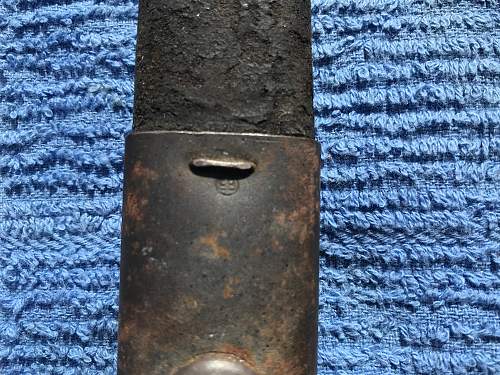 Scabbard bought at Antique store, need help identifying.