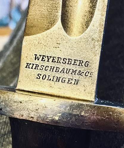 PLEASE HELP. Unidentifiable stamp symbol on metal scabbard of German made Chilean issued M1895
