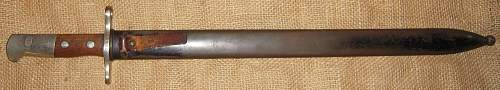 Possible very rare maker’s mark on Swiss M1914 Pioneer sawback bayonet?