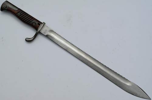 Mauser M1898/05 Sawback butcher bayonet indentification and info needed please.