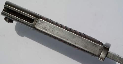 Mauser M1898/05 Sawback butcher bayonet indentification and info needed please.