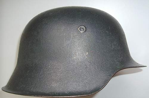 Odd ...  Bundesgrenzschutz helmet showin´ czech chin strap ...