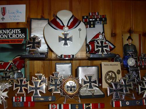 Info about 1957 Iron Cross and War Merit Cross.