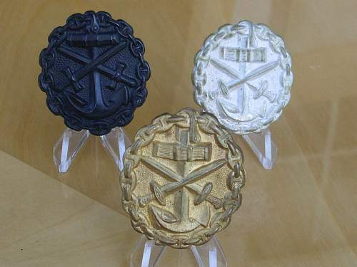 Post war Imperial Naval wound badges...........