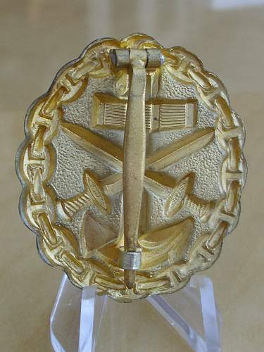 Post war Imperial Naval wound badges...........