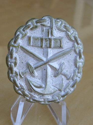 Post war Imperial Naval wound badges...........