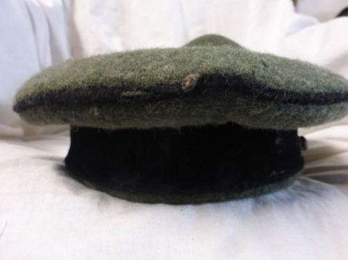 Is this a original ww2 german visor cap ?