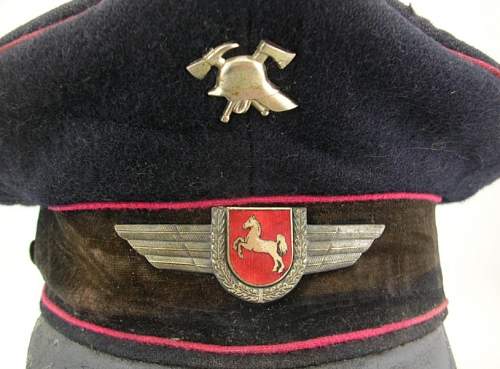Civilian cap expertise, Period cap with post war insignia?
