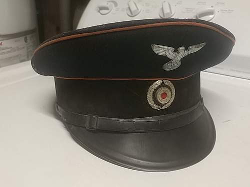 Postal cap real deal?