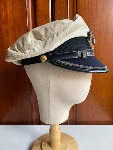 Need Help！Kriegsmarine white visor cap of officer Original or Post war？