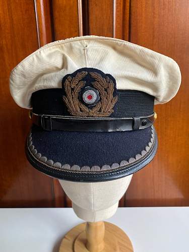 Need Help！Kriegsmarine white visor cap of officer Original or Post war？