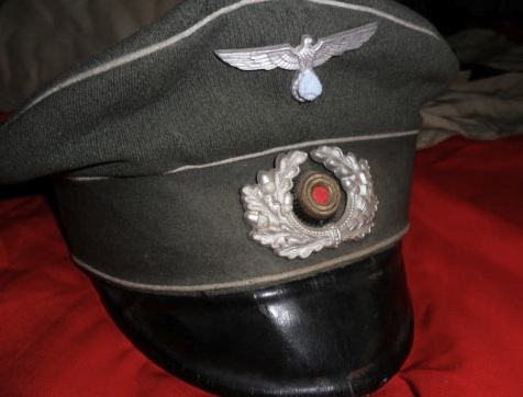 German infantry NCO's peaked cap, real or fake.