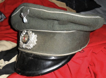 German infantry NCO's peaked cap, real or fake.