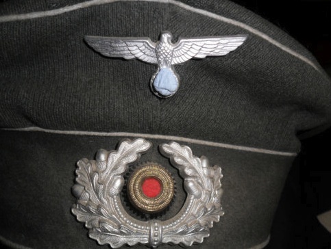 German infantry NCO's peaked cap, real or fake.