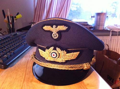 Luftwaffe and Waffen ss cap insignia