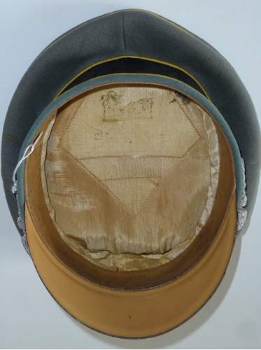 Waffen-SS yellow-piped officer visor - real ?