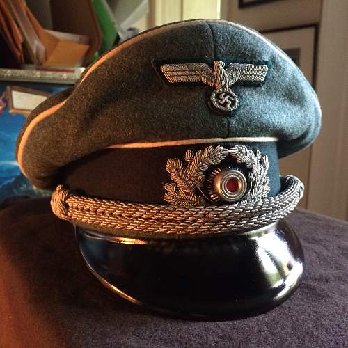 WWII period Artillery cap? Nice looking cap, decent pics.
