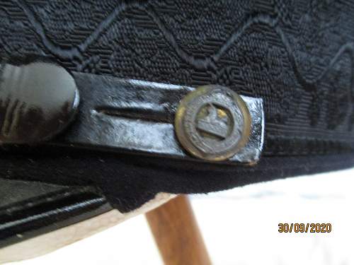 Two British officer visor caps