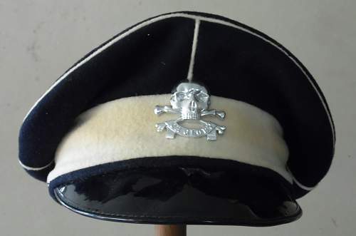 Any thoughts on this 17/21st Lancers cap...