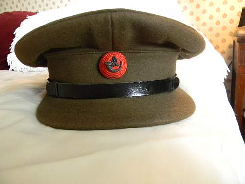 Some WWII era British Army officer visor caps.