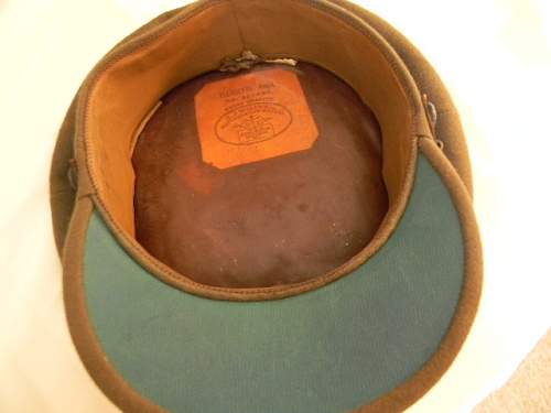 Some WWII era British Army officer visor caps.