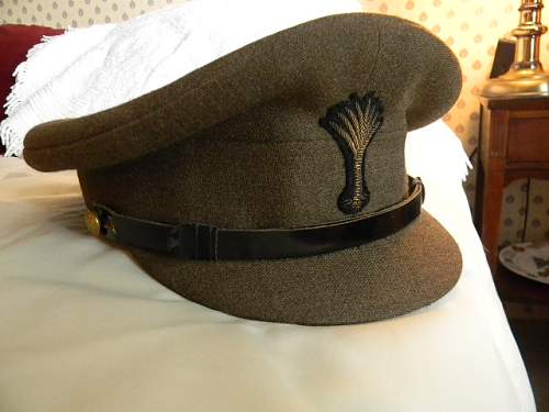 Some WWII era British Army officer visor caps.