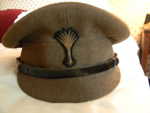 Some WWII era British Army officer visor caps.