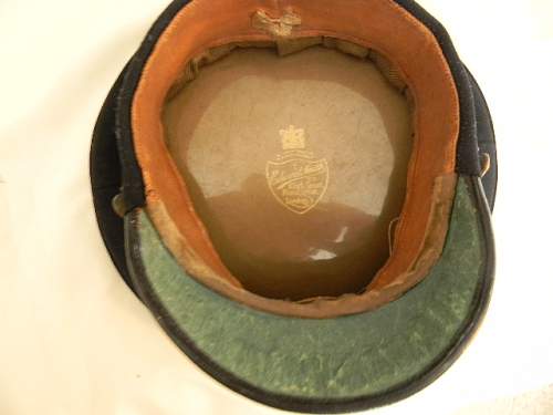 Some WWII era British Army officer visor caps.
