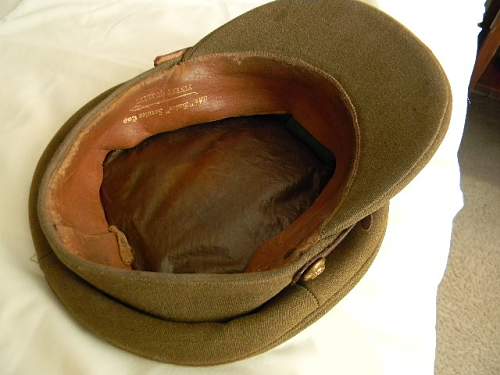 Some WWII era British Army officer visor caps.