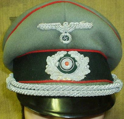 WW2 German Visor Cap ( medical) Theater made Eagle ?