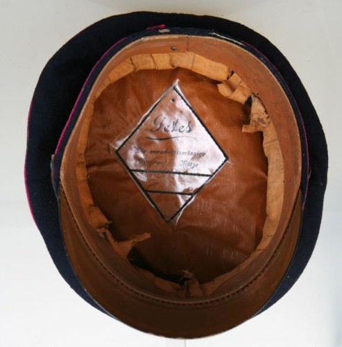 I was wondering if anyone could identify this cap, real or fake?