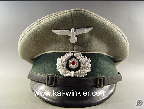 Could anyone help me please as to this NCOs/EMs Heer visor cap? Many thanks