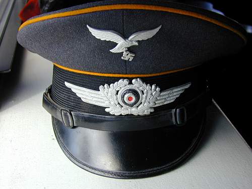 I have a question regarding some Luftwaffe visor cap peaks.