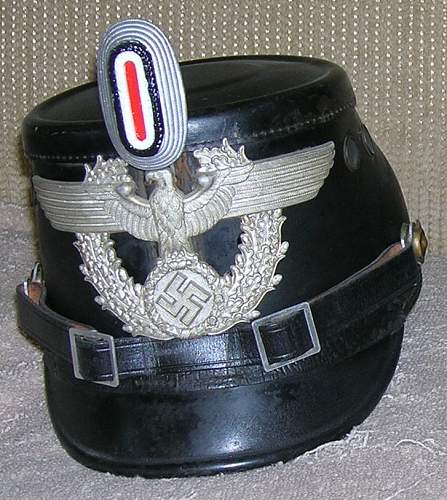 Heer Officers Einheitsfeldmütze and Police shako for evaluation