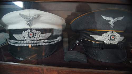 Luftwaffe Summer visor and Flak officer visor, both named.