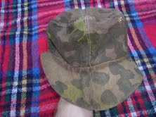 Seeking owner of SS camo cap sold in 2009 at Collectors guild