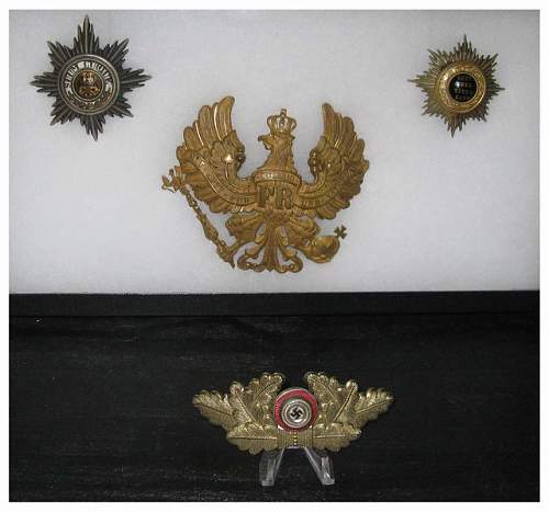 Help-Can anyone identify this visor cap badge?