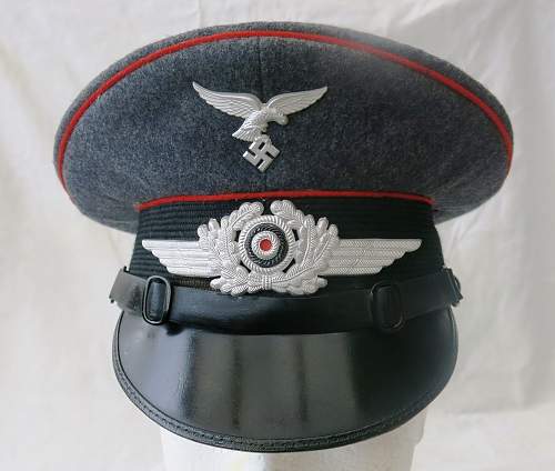 An illuminating Carl Halfar OR/NCO Flak visor cap