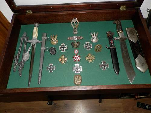 my small collection bayonets,daggers,badges,insignia 1842-1955