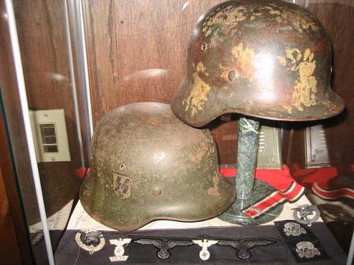 A few of my Camo Helmets on display