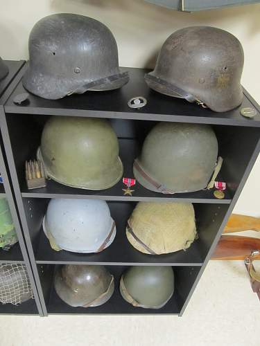 My wall o' helmets/room display