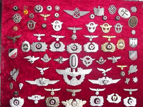 Third Reich head gear insignia very varied
