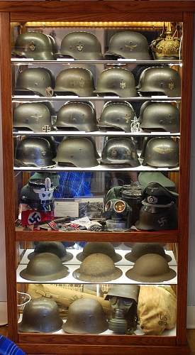 Glass dome to protect black SS visor hat on display