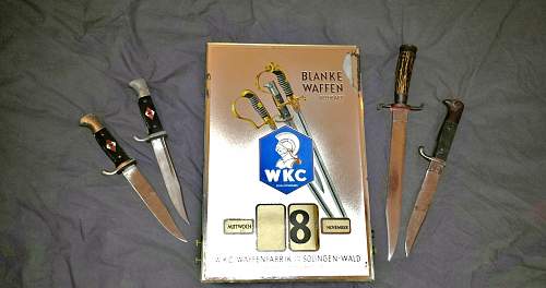 WKC Calender mirror display of Edged Weapons