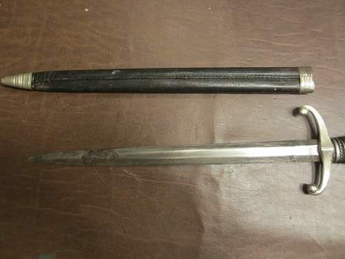 Ww2 German dagger with leather scabbard?