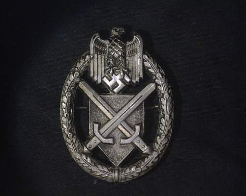 Police badge with crossed swords.