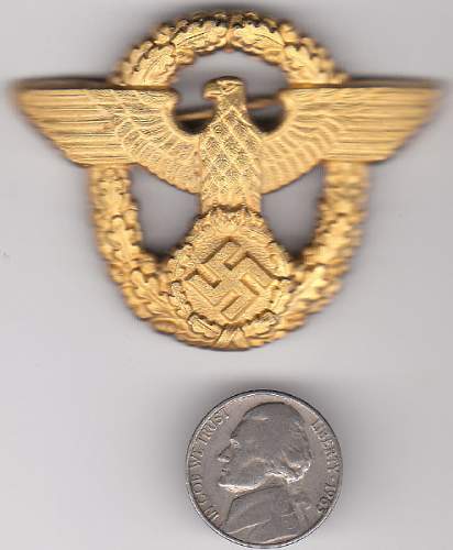 Gilded Police eagle and wreath for peaked visor ....... original or fake ?