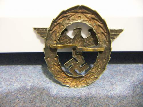 Police hat badge