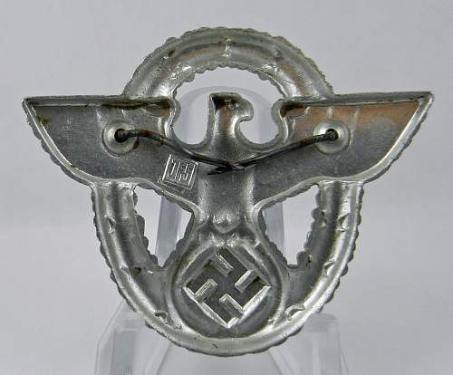 Police hat badge